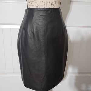 Monica's Black Leather Skirt